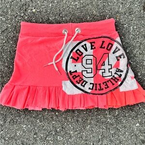 Pink Athletic Skirt with Ruffle Hem